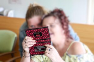 Blurred photo of Maree and carer