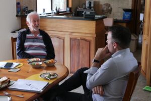 John talking with an AnglicareSA employee