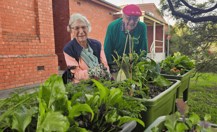 Bob at the Garden Club with Betty, who is another attendee of the Garden Club