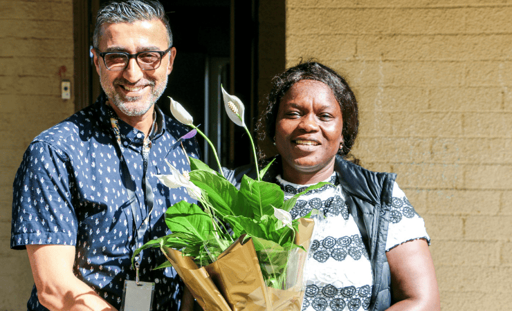 AnglicareSA Housing Options Coordinator, Ali Akbarpour, congratulated Susan on the new home with flowers.