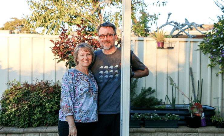 Foster care parents Chris and Tamara in their garden