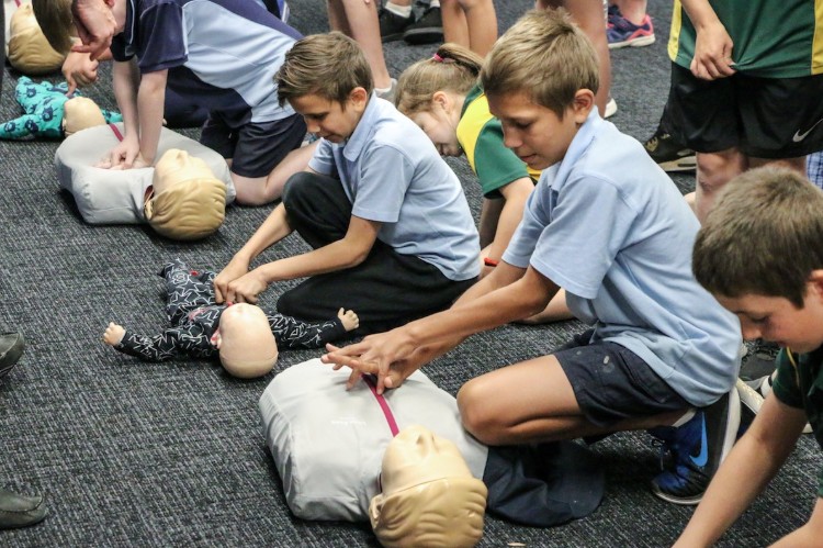 Students from Blakeview and Munno Para primary schools engaging in first aid.