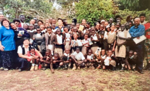 Old photo of school group posed outside in kenya